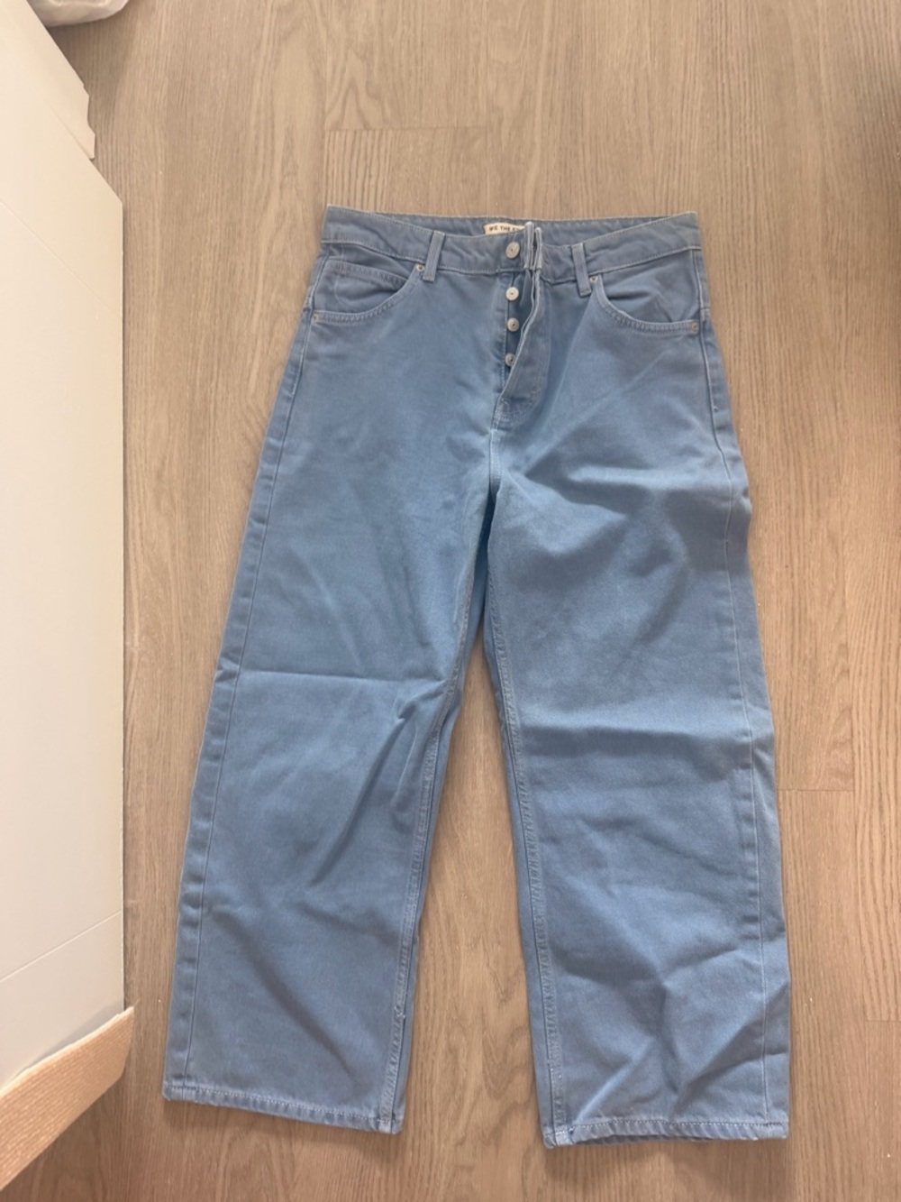We The Free Light Blue Denim Jeans with Leather Logo Patch